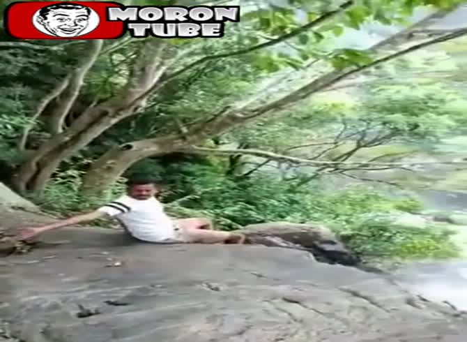 Video :For a Tiktok film, he approaches a waterfall as closely as he can, and the moment becomes dramatic